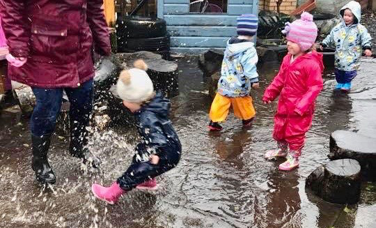 FCSS - kids playing in puddles