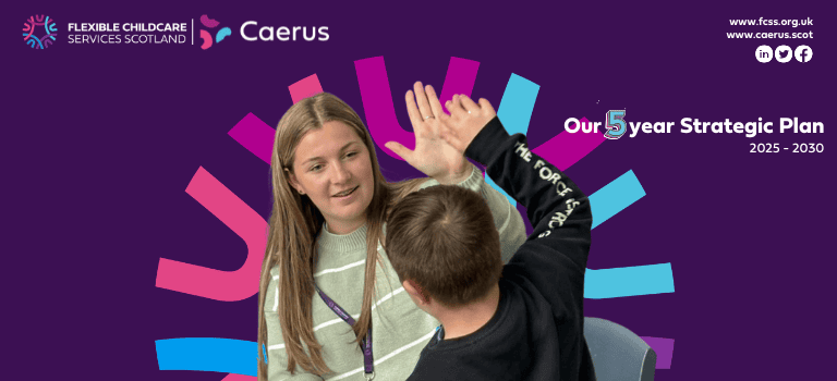 FCSS team member and child high 5 each other